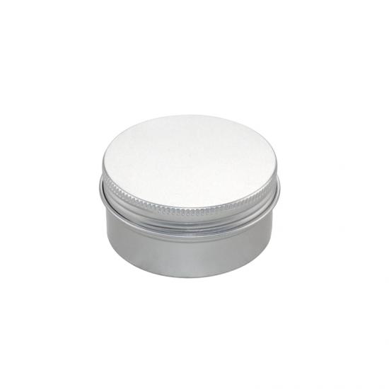 Small empty cosmetic tin container